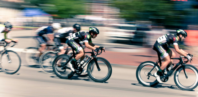 Bike racers racing by fast